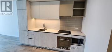 Vaughan (Vaughan Corporate Centre) condo for rent - A kitchen with a sink, stove and oven.