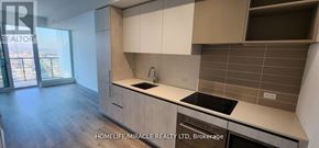 Vaughan (Vaughan Corporate Centre) condo for rent - A kitchen with a sink, stove and oven.