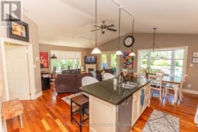 Caledon apartment for rent - A kitchen with a bar and a dining table.