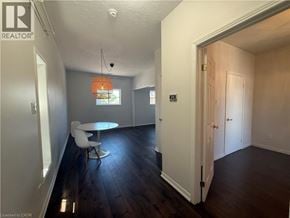 Hamilton apartment for rent - A room with a table and chairs in it.