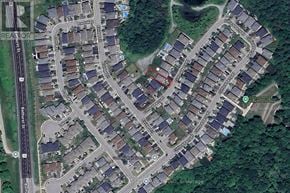 Newmarket (Woodland Hill) apartment for rent - A satellite image of a residential area with houses and streets.