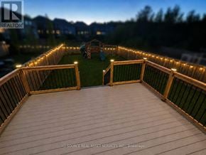 Newmarket (Woodland Hill) apartment for rent - A deck with lights and a slide in the background.