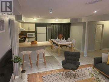 Mississauga (Churchill Meadows) apartment for rent - A well-lit kitchen with a dining table and chairs.