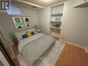 Mississauga (Churchill Meadows) apartment for rent - A bedroom with a bed, pillows, and a nightstand.