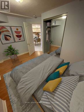 Mississauga (Churchill Meadows) apartment for rent - A bedroom with a bed and a plant.