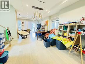 Vancouver apartment for rent - A room with a lot of toys and a slide.