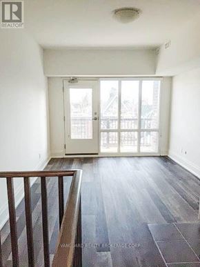 Toronto (Dovercourt-Wallace Emerson-Junction) apartment for rent - A room with a door and a window.