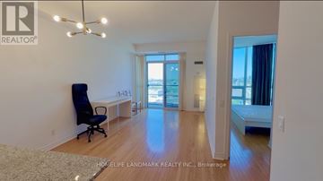 Toronto (Bendale) condo for rent - A realtor's office with a view of the city.