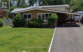 Burlington (Appleby) apartment for rent - A house with a lawn in front of it.