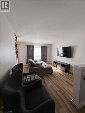 Hamilton apartment for rent - A room with wooden flooring and a window.