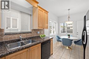 Vancouver apartment for rent - A kitchen with a sink, a dishwasher, and a refrigerator.