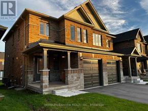 Barrie (Painswick South) apartment for rent - A large, two-story house with a garage is showcased in the image.