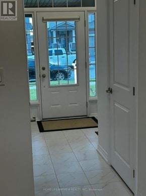 Barrie (Painswick South) apartment for rent - A white door with a glass window is open.