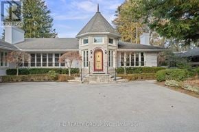 Toronto (Bridle Path-Sunnybrook-York Mills) apartment for rent - A house with a red door and a grey roof is for sale.