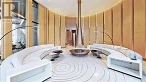 Toronto (Bay Street Corridor) condo for rent - A white circular room with a spiral design on the floor.