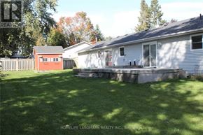 Whitchurch-Stouffville apartment for rent - A house with a red shed in the backyard.