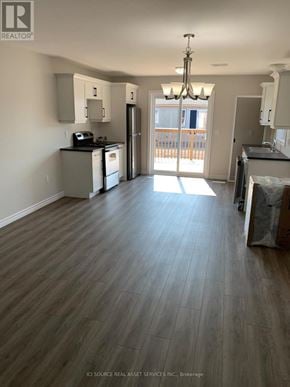 Belleville (Belleville Ward) apartment for rent - A kitchen with a refrigerator, stove, and oven.