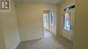 Markham (Middlefield) townhouse for rent - A room with a door and a window.
