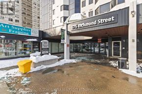London East (East F) condo for rent - A street view of Richmond Street with a signboard and a yellow container.
