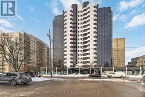 London East (East F) condo for rent - A building with the sign "TEAM GLASSER REAL ESTATE BROKERAGE INC." in front of it.