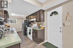 Windsor multi-family for rent - A kitchen with a sink, stove, and refrigerator.