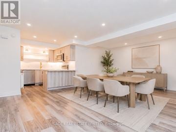 Toronto (Forest Hill South) fourplex for rent - A dining room with a table set for six.