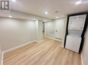 Toronto (Weston) apartment for rent - A room with a washer and dryer in it.