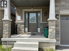 Brantford apartment for rent - A house with a sign that says "Lot 21" on the front door.