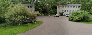 Kalamazoo apartment for rent - A sign that says "Countrylane" is on the side of a road.