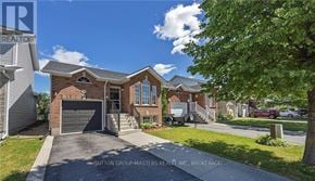 Kingston (Kingston East (Incl Barret Crt)) apartment for rent - A house with a garage is shown in the image.