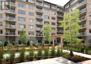 King (Schomberg) condo for rent - A large building with the word REALTOR on the side.