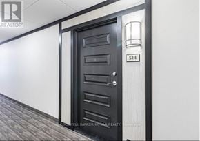 King (Schomberg) condo for rent - A black door with a glass window above it and a number 514 on the glass.