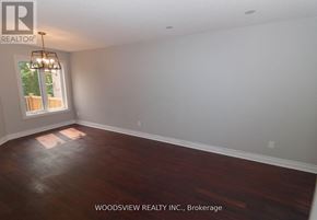 Aurora (Bayview Wellington) apartment for rent - A room with a large window and a chandelier is for sale.