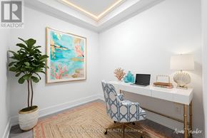 Toronto (Dovercourt-Wallace Emerson-Junction) condo for rent - A room with a desk, chair, and a painting on the wall.