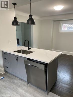 Hamilton apartment for rent - A kitchen with a white counter top and a dishwasher.