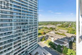 Toronto (Newtonbrook East) condo for rent - A tall building with the words "HOMELIFE MIRACLE REALTY LTD, Brokerage" on it.