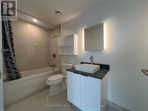 Toronto (Church-Yonge Corridor) condo for rent - A white bathroom with a sink, toilet and bathtub.