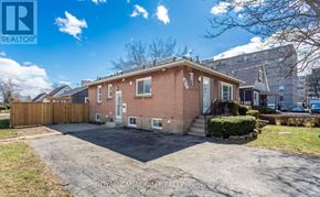 Hamilton (Hill Park) apartment for rent - A red brick house with a white door and windows is for sale.