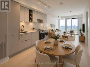 Mississauga (City Centre) condo for rent - A modern kitchen with a dining table set for six.