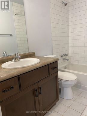 London South (South J) condo for rent - A bathroom with a sink, toilet and bathtub.