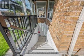 Pickering (Woodlands) apartment for rent - A staircase with a metal railing leads to a glass door.