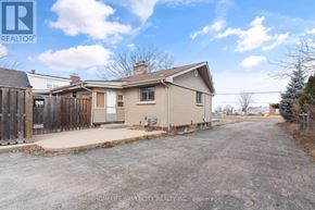 Hamilton (Stoney Creek) apartment for rent - A house with a driveway in front of it is for sale.