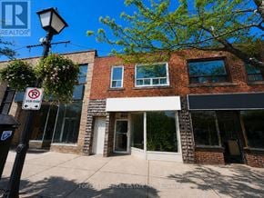 Mississauga (Port Credit) apartment for rent - A street view of a building with a no parking sign.