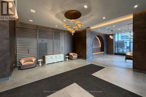 Vaughan (Vellore Village) condo for rent - A spacious waiting area with a patterned wall and a chandelier.