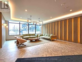 Toronto (Banbury-Don Mills) condo for rent - A spacious living room with a large window and a view of the city.