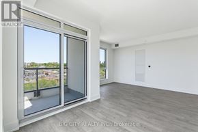 Toronto (Dovercourt-Wallace Emerson-Junction) condo for rent - A room with a sliding glass door leading to a balcony.
