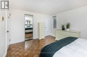 Mississauga (Creditview) apartment for rent - A bedroom with a bed, dresser, and mirror.