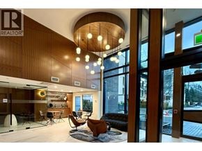 West Vancouver apartment for rent - A living room with a couch, chairs, and a rug.