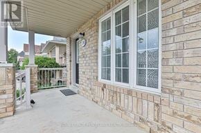 Markham (Wismer) apartment for rent - A pigeon is standing on a concrete patio.