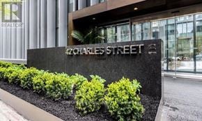 Toronto (Church-Yonge Corridor) condo for rent - A building with a sign that says Charles Street.
